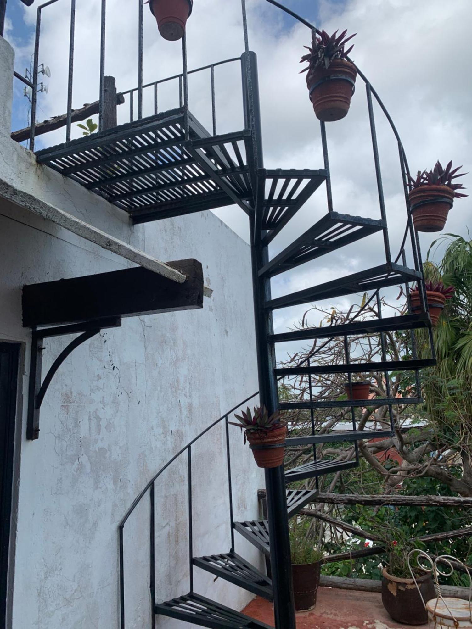 Casa Caribe Cancun Ngoại thất bức ảnh Spiral staircase