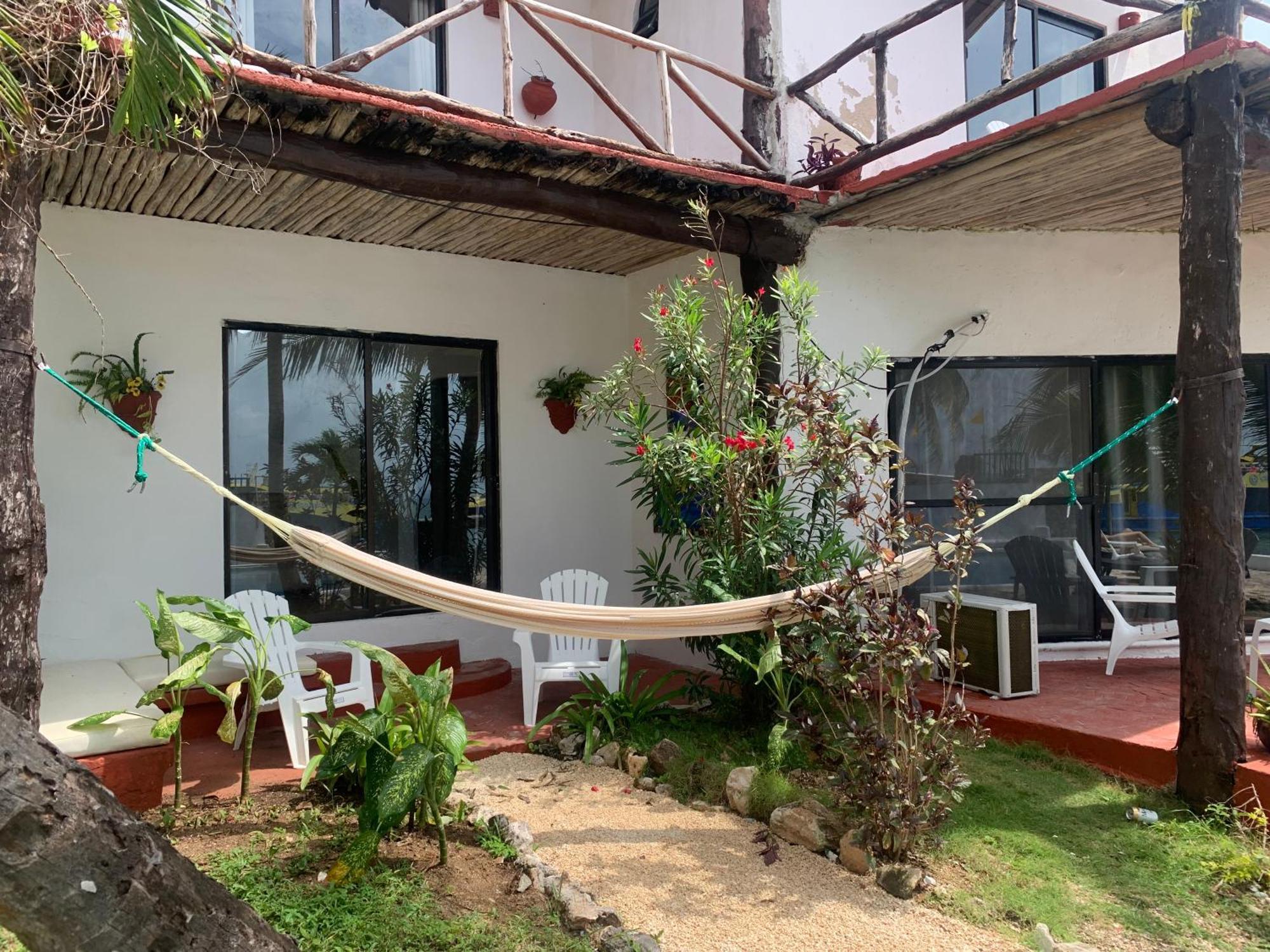 Casa Caribe Cancun Ngoại thất bức ảnh A hammock in a hotel in San Juan del Sur, Nicaragua
